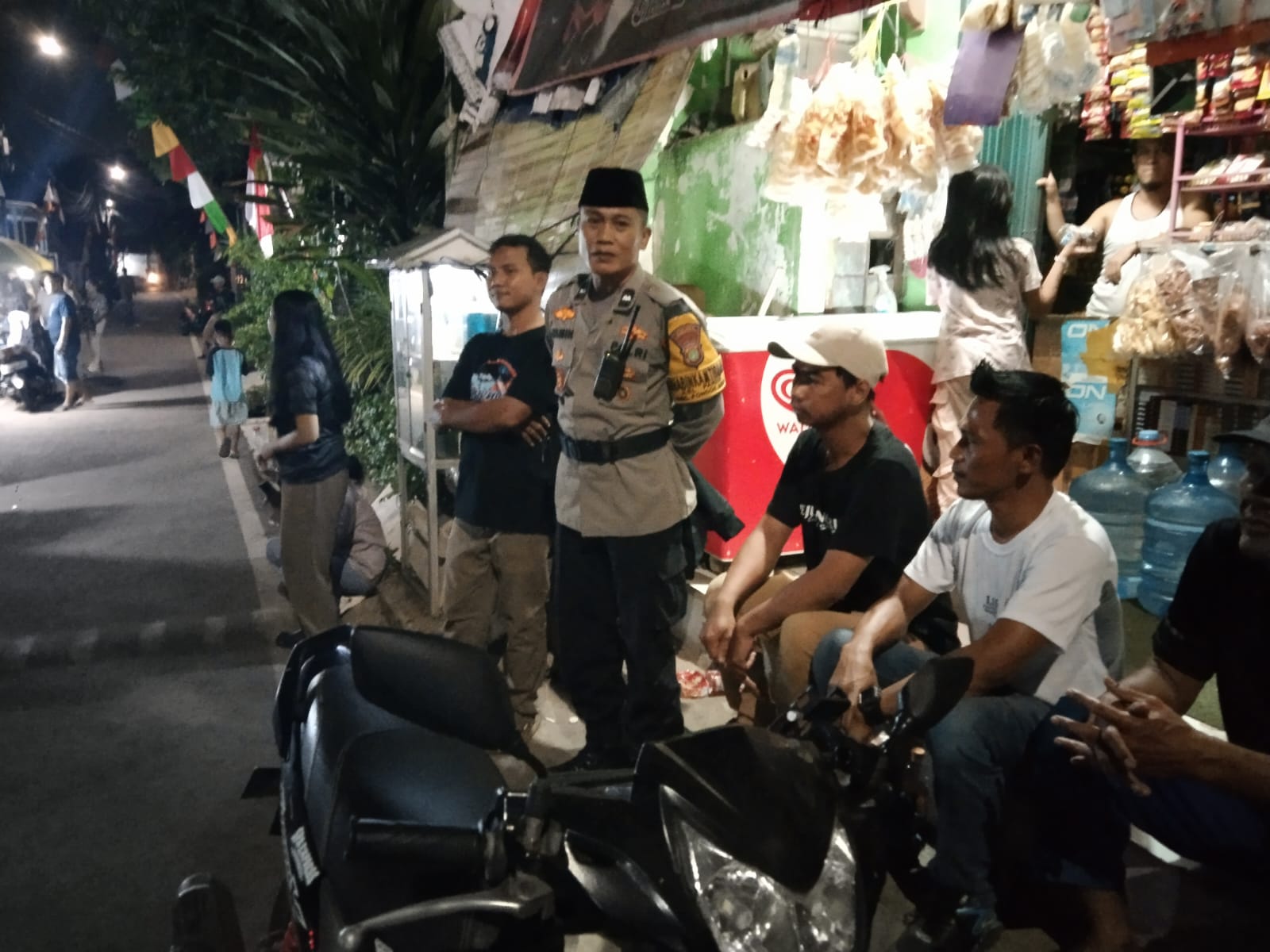 Bhabinkamtibmas Polsek Pondok Aren Hadiri Malam Puncak HUT RI ke-81, Sampaikan Pesan Kamtibmas